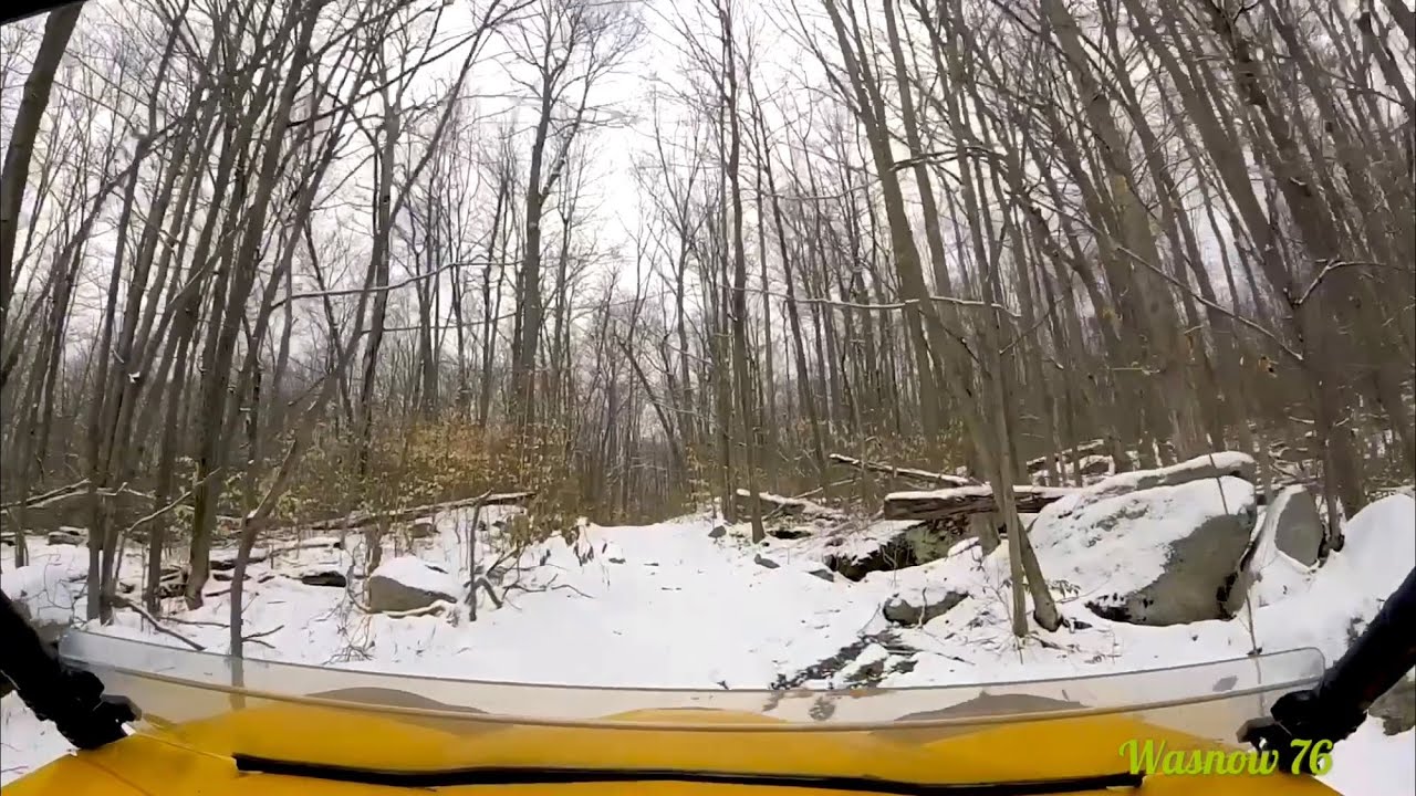 Rocky snow covered hill climb in the Can-am Commander 1000xt
