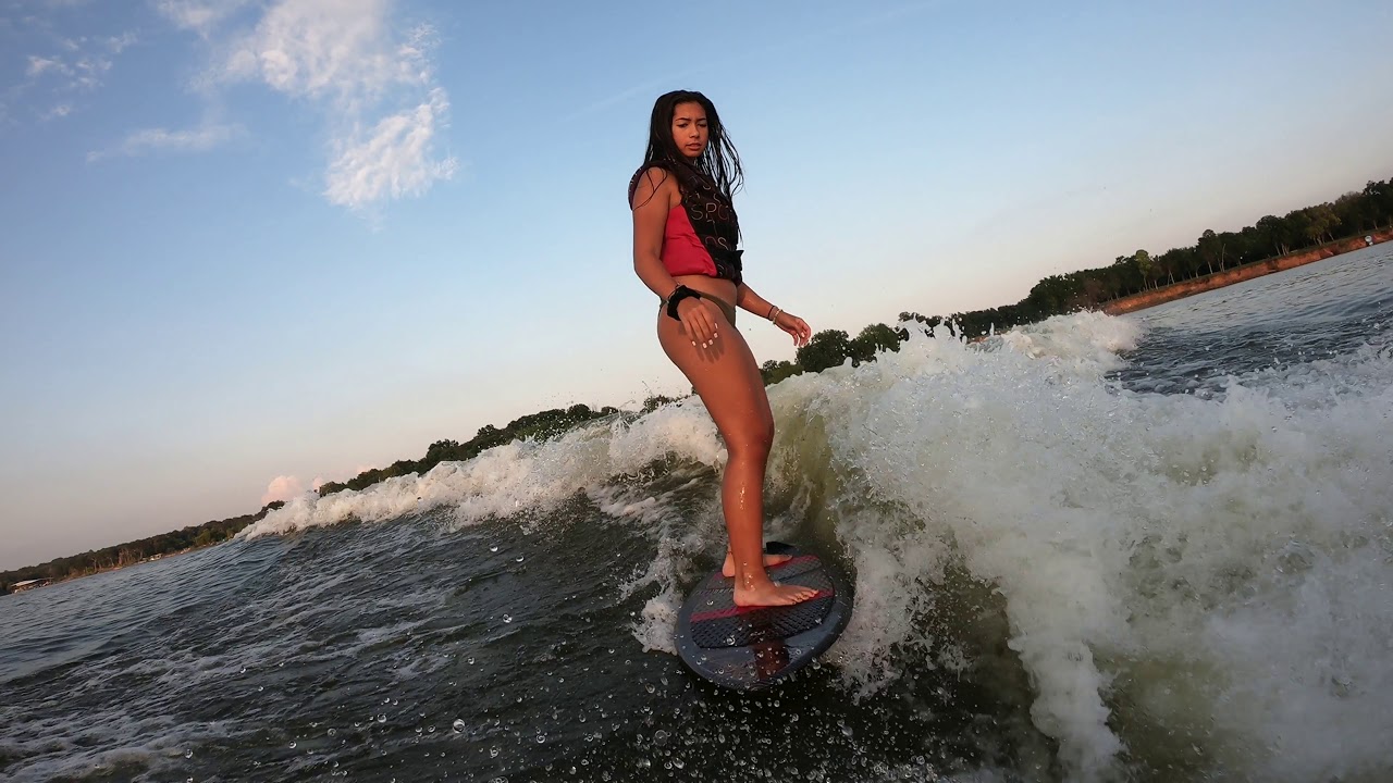 Wake Surfing behind a Scarab 255 Wake