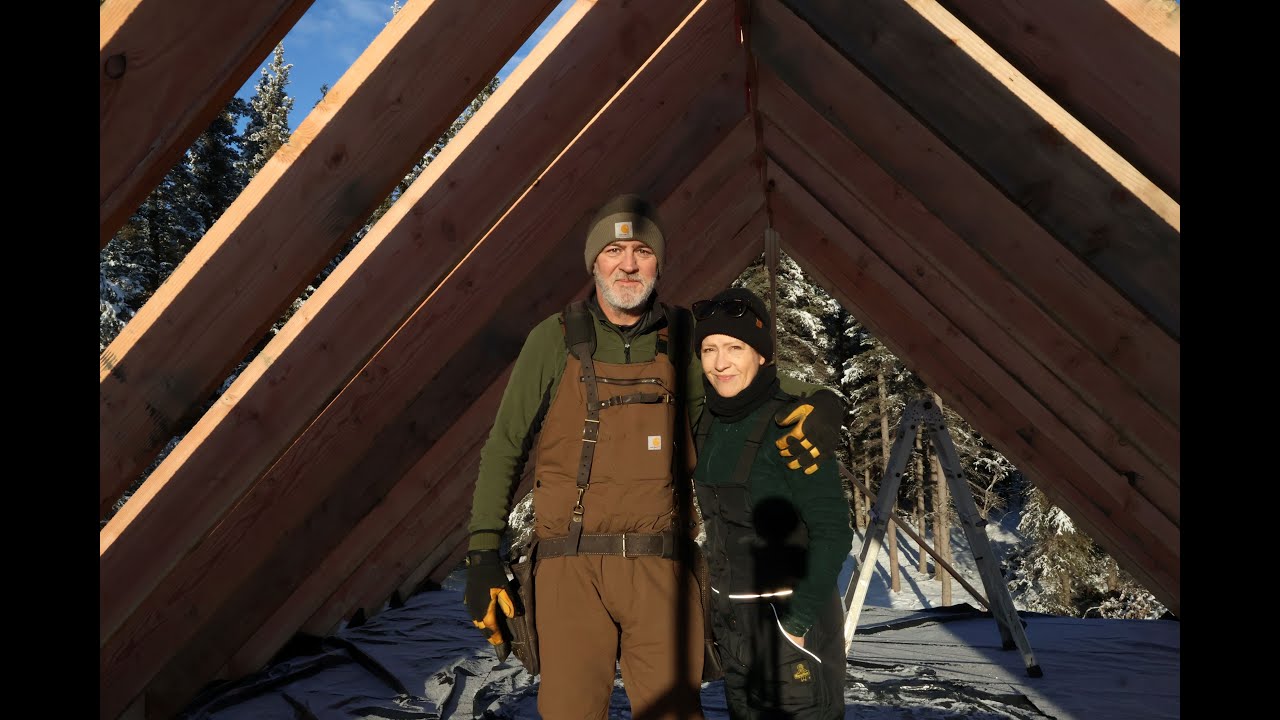 Winter is Here and Brings Challenges to Our Off Grid Cabin Build. Rafters are Up and Roof is Next!