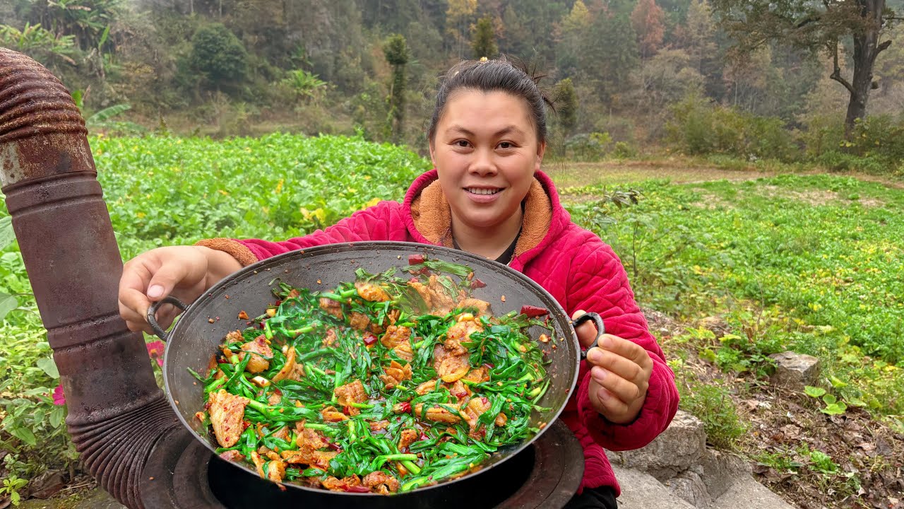 今天做一大锅美味的蒜苗炒肉吃过瘾 Today, stir fry pork with fresh garlic sprouts