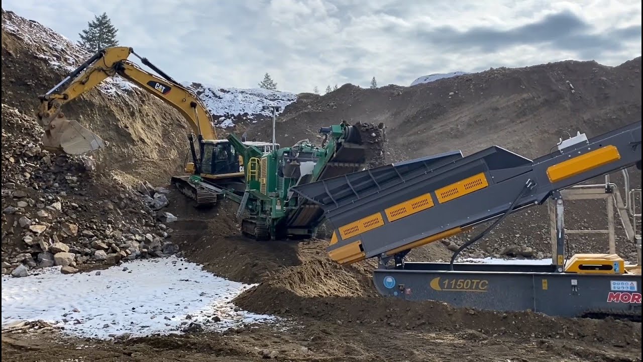 DUMP TRUCKS #24 &mdash; First Run Of New Rock Crushing Equipment Reducing 24&rdquo; Bedrock To 3/4&rdquo; Spec