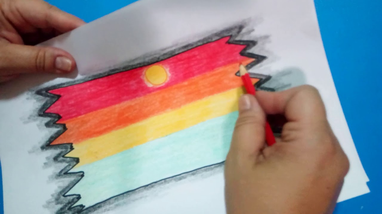 Como desenhar um pôr do sol com cores quentes.