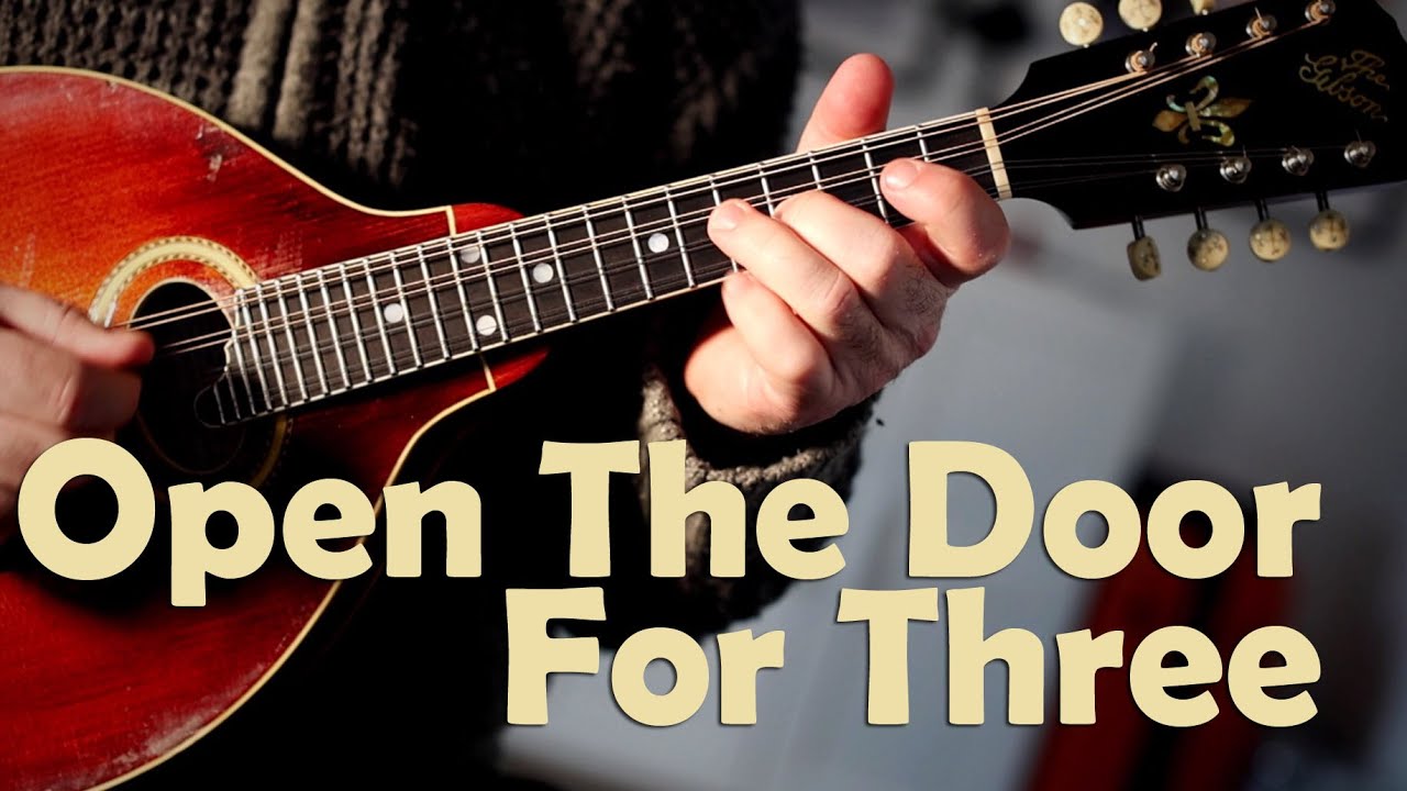 Mandolin tunes. Open the door for three (slip jig)