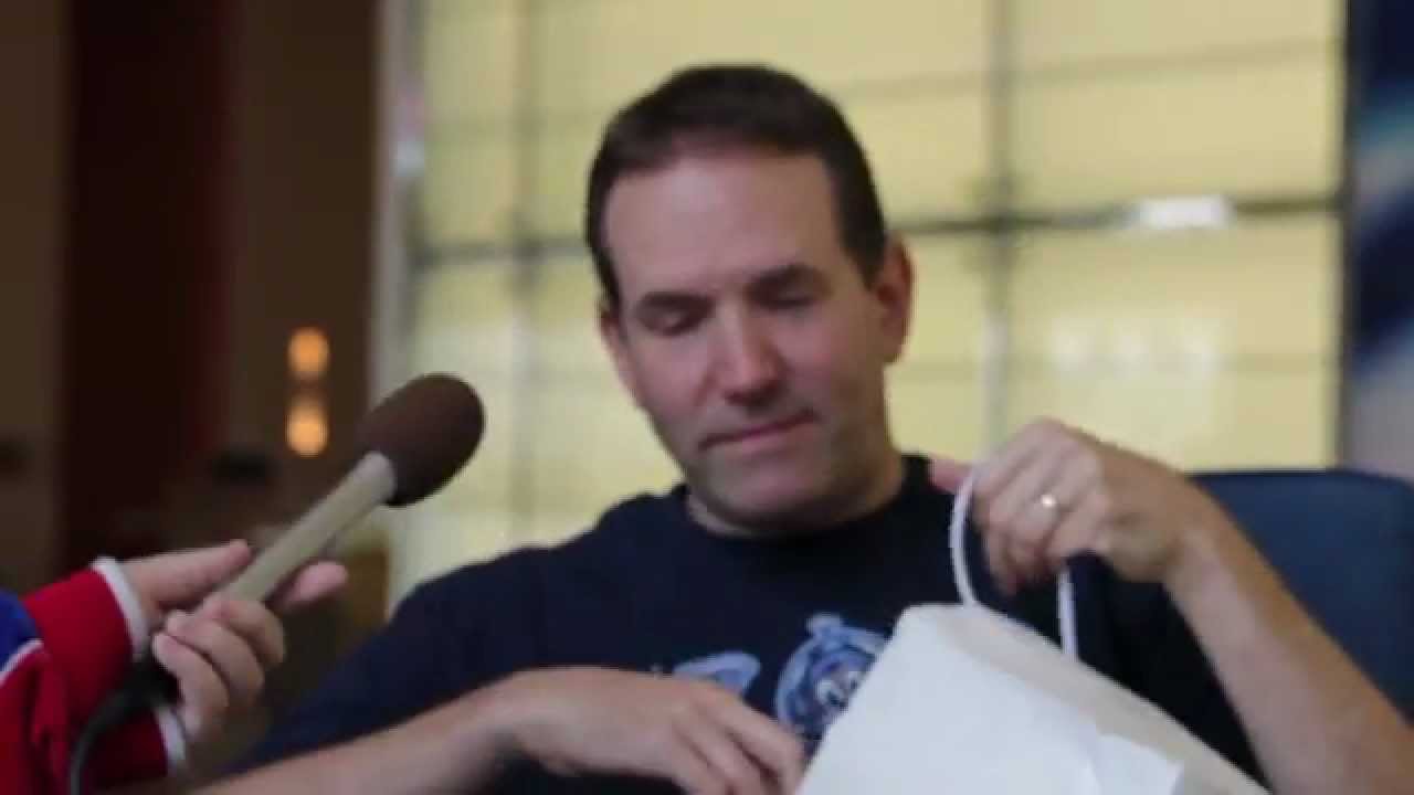 Greg Benson opens the gift bag