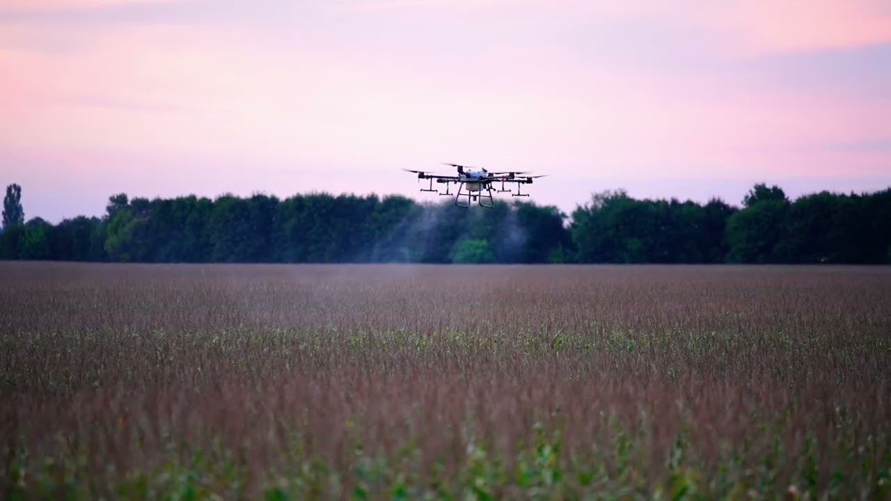 🌾 Witness the Future of Farming with Spray Drones in Action! 🚁🌿