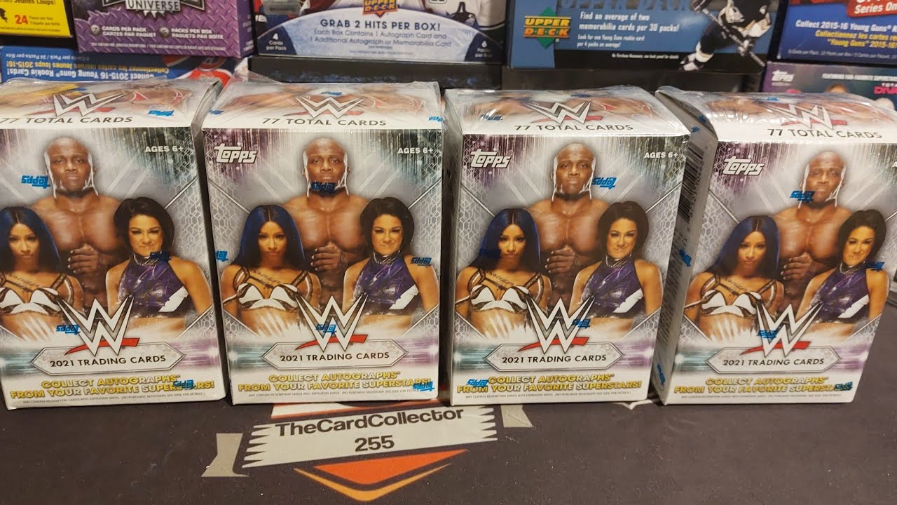4 бластера, открывающие флагманскую коллекционную карточку WWE 2021 года, боксы для рестлинга