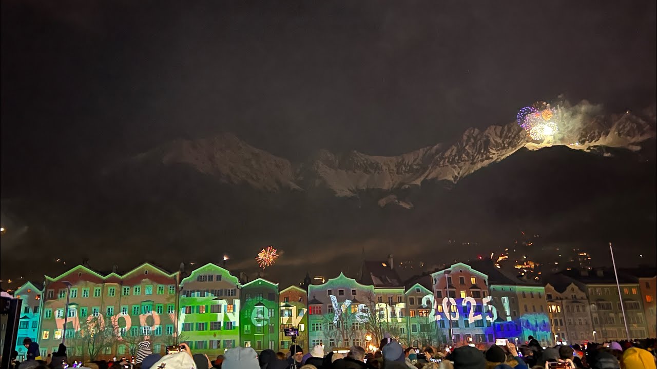 New Year‘s Eve 2025 in Innsbruck/Austria with fireworks on the mountains above the city