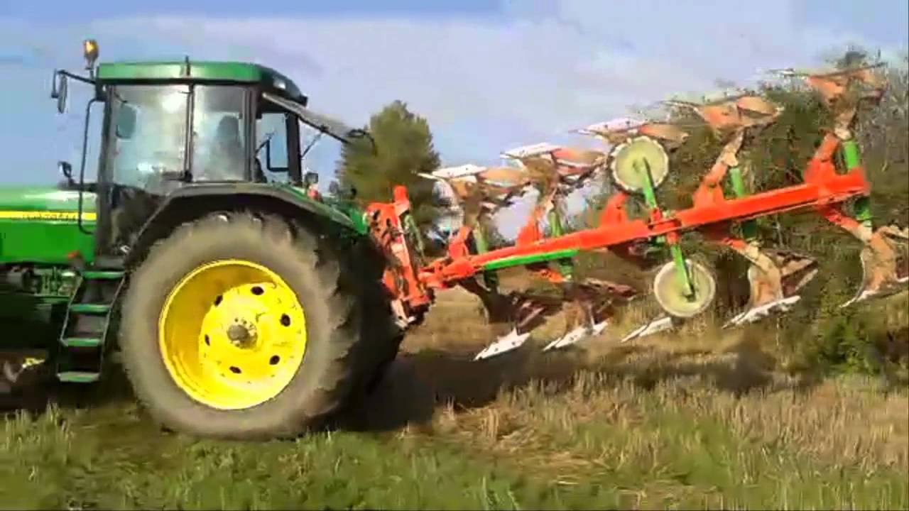 John Deere 7810 con arado Castillón