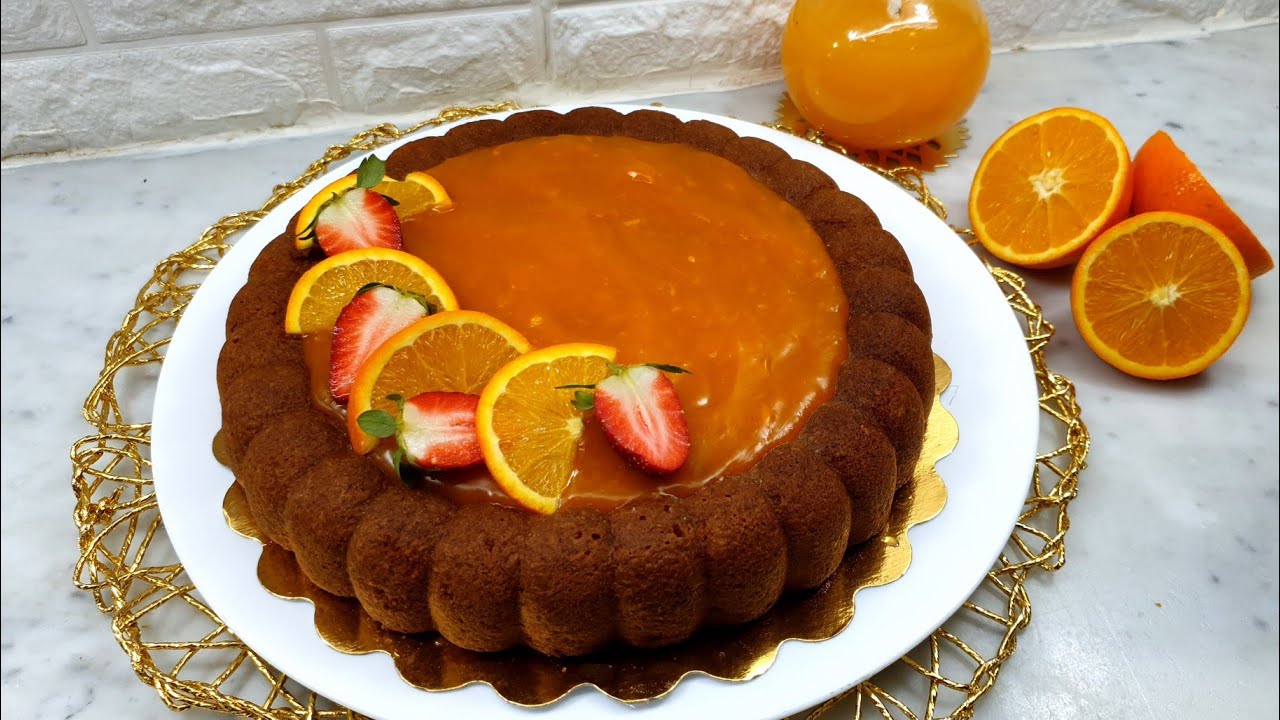 كيكة بذوق البرتقال خفيفة ومشربة بصوص ولا أروع لازم تجربوها 😋😋😋