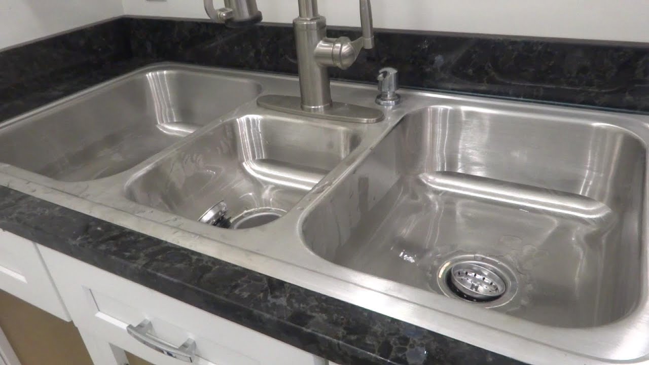 3 bay kitchen sink hooked up in comercial building
