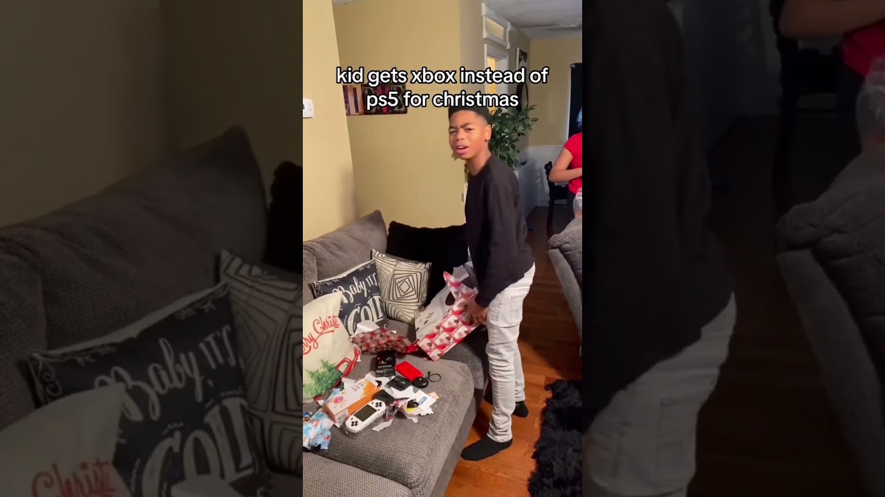 A kid receives an XBOX over a PlayStation for Christmas