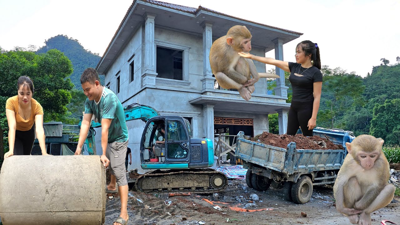 The excavator and truck I worked in the largest building in the village.