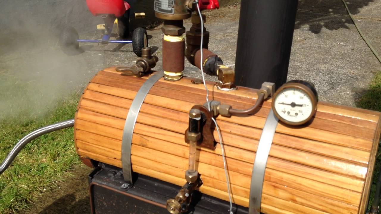 Tiny power W steam engine running