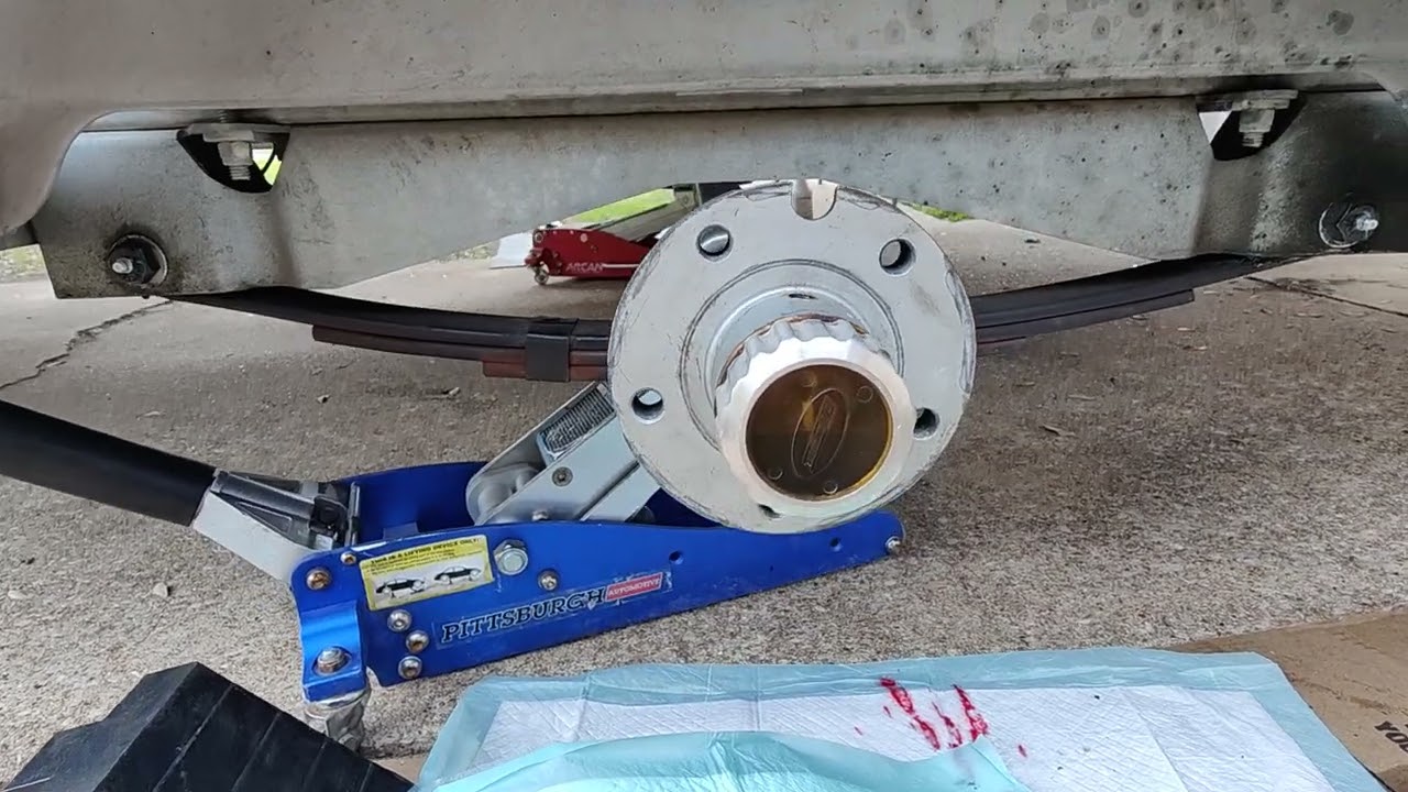 Servicing oil filled hubs.  EZ-Loader Reliable brand hubs.