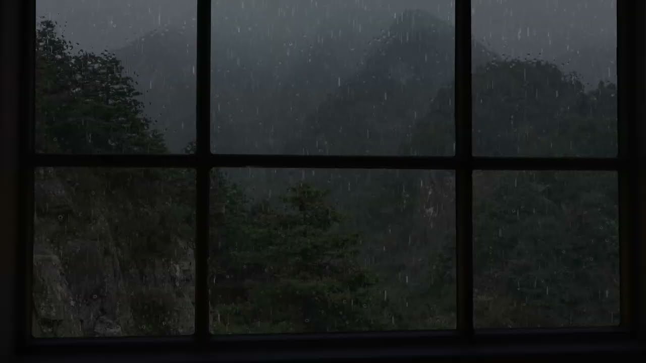 Find your own room tonight - a window view with rain on the hills
