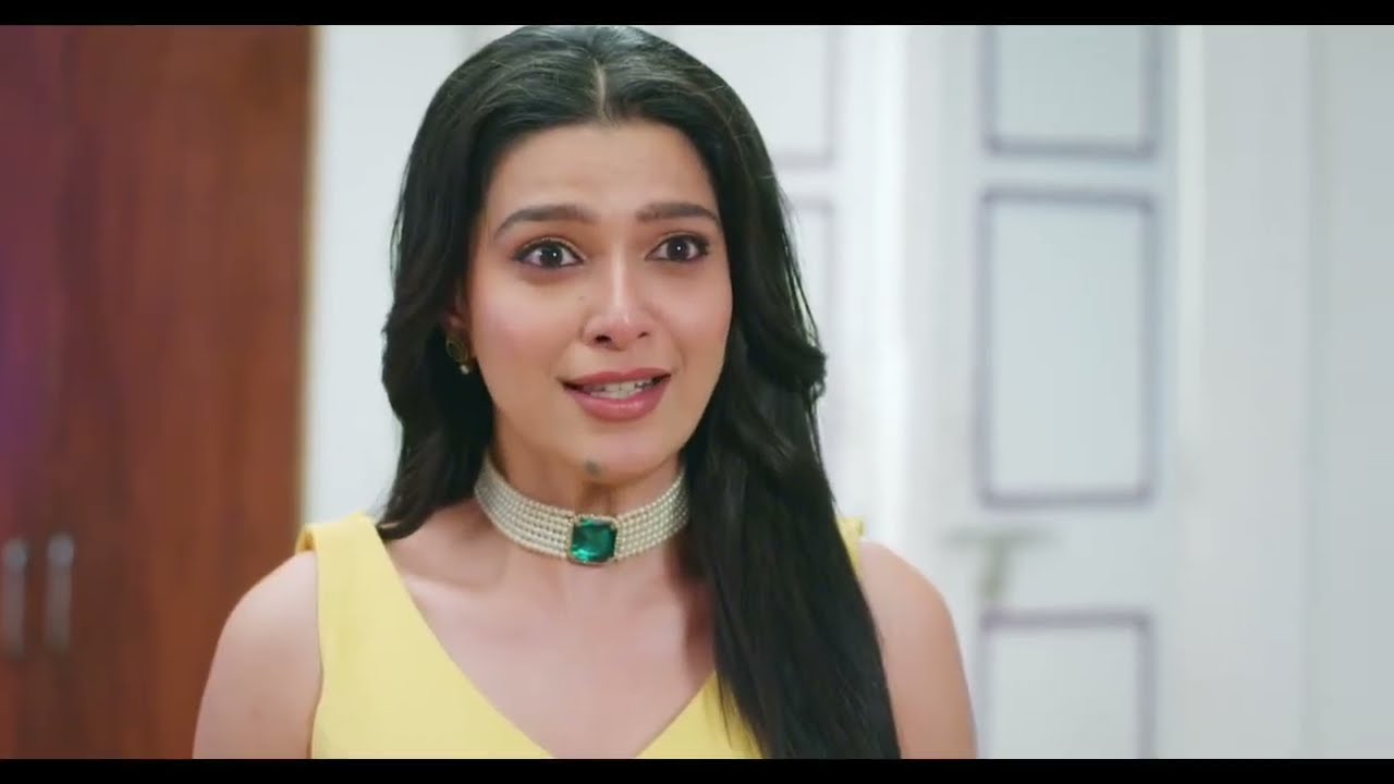 Pratham applies color to Radhika