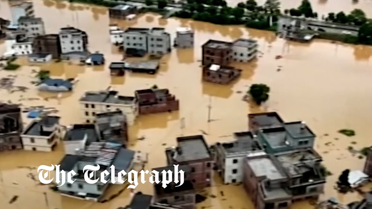 China flooding: Bulldozer used to rescue residents after severe weather