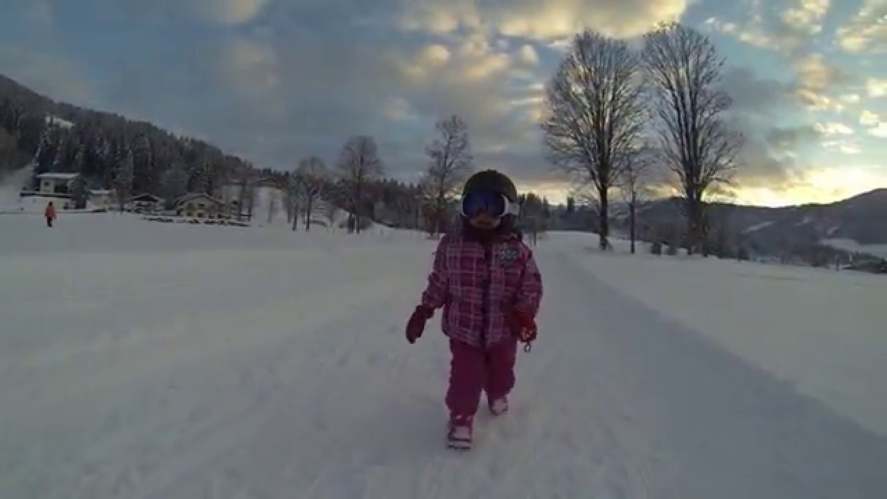 Naomi  2 year old 1st time Snowboarding on the slopes of Westendorf Austria