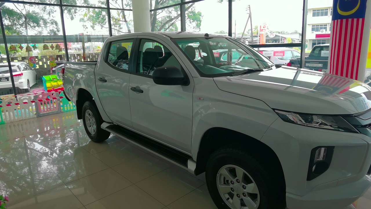 Triton 2.4L Standard Auto VGT 4x4.