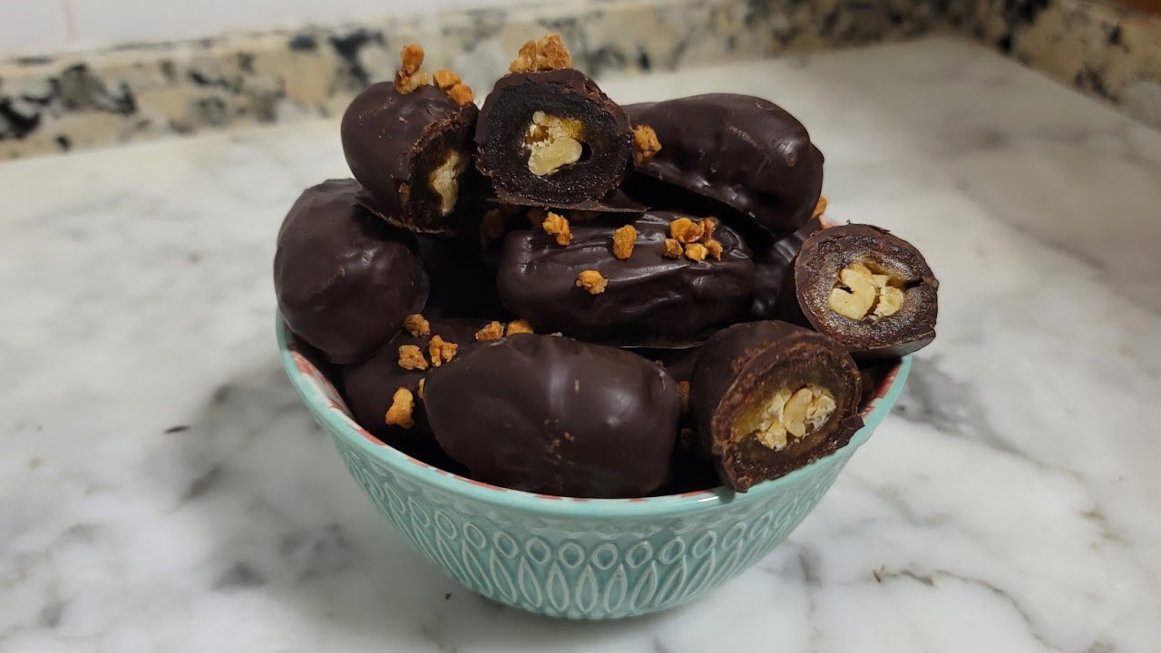 Datiles rellenos de nuecescon cobertura de chocolate (muy facil)