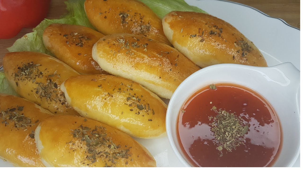 zachte gehaktbroodjes  خبيزات معمرين بالكفتة