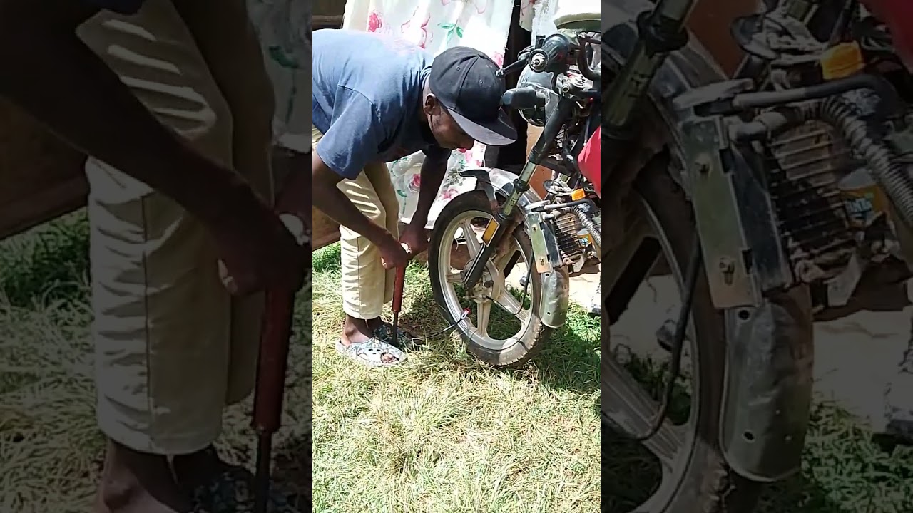Pumping pressure on the front wheel after a puncture #motorcyclejourneys