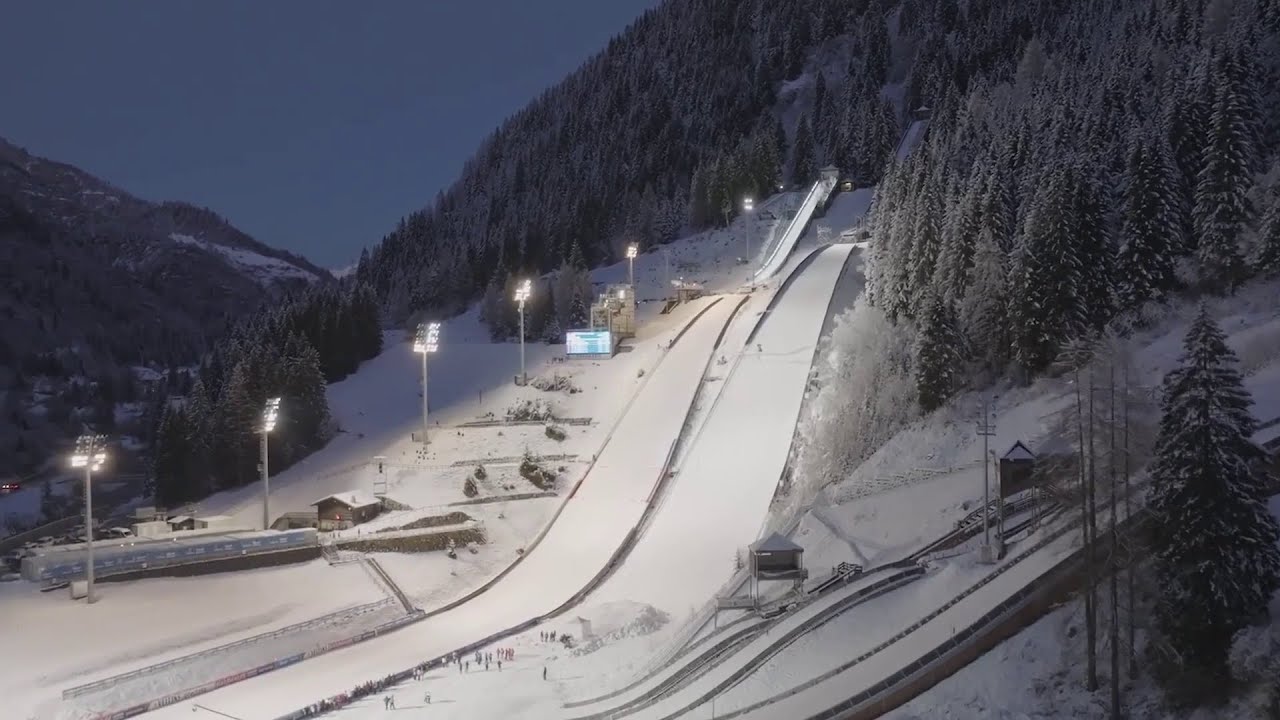 MILANO-CORTINA 2026 – Il nuovo stadio del salto di Predazzo: su nel cielo fino a 143 metri a 95 km/h