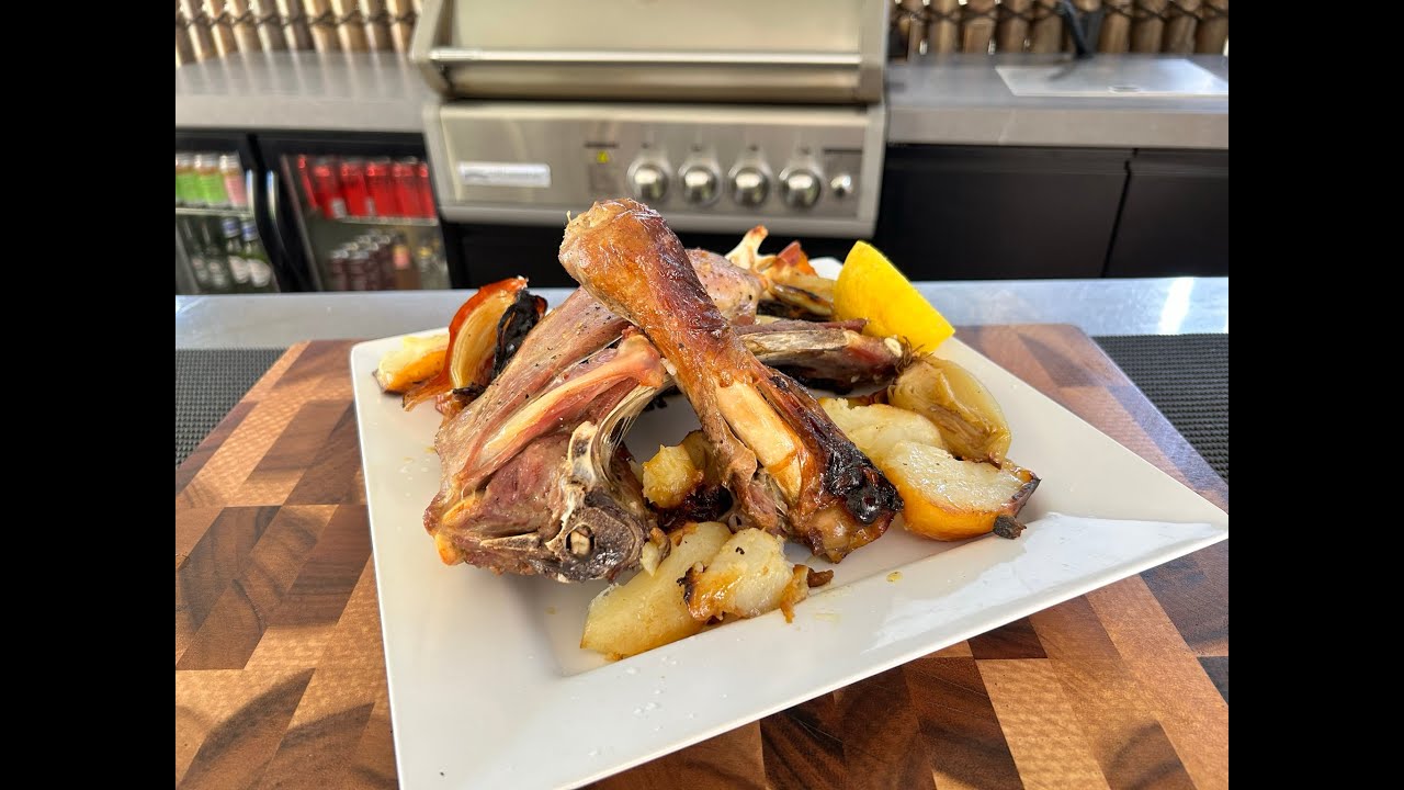Greek-style lamb shoulder with lemon and potatoes by Jack The Greek
