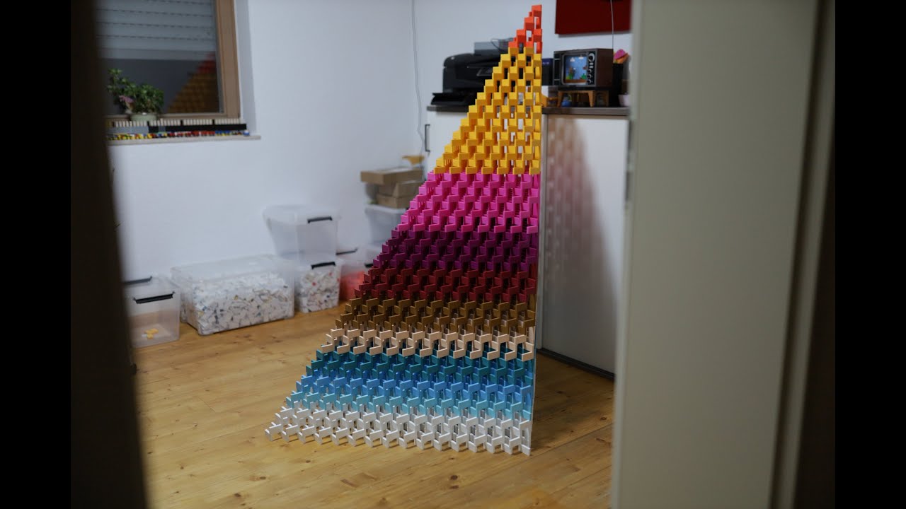 UNOFFICAL WORLD RECORD - Largest 3D Domino Quarter Pyramid