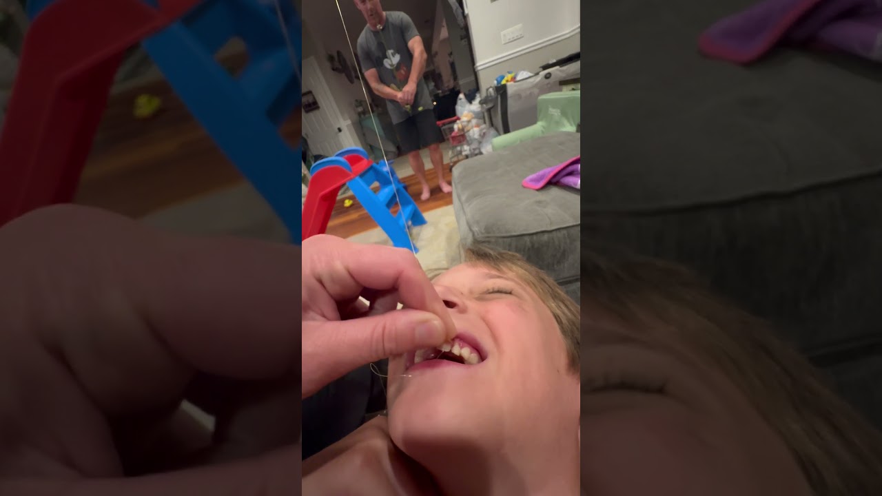 Best way to pull out a tooth! #toothfairy #loosetooth #toothless #insanemullane #pulloutatooth #fish