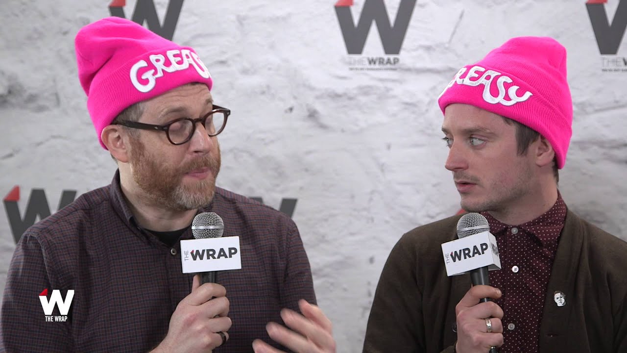'The Greasy Strangler' Producer Elijah Wood Talks Father Son Rivalry, Naked Men and Body Parts