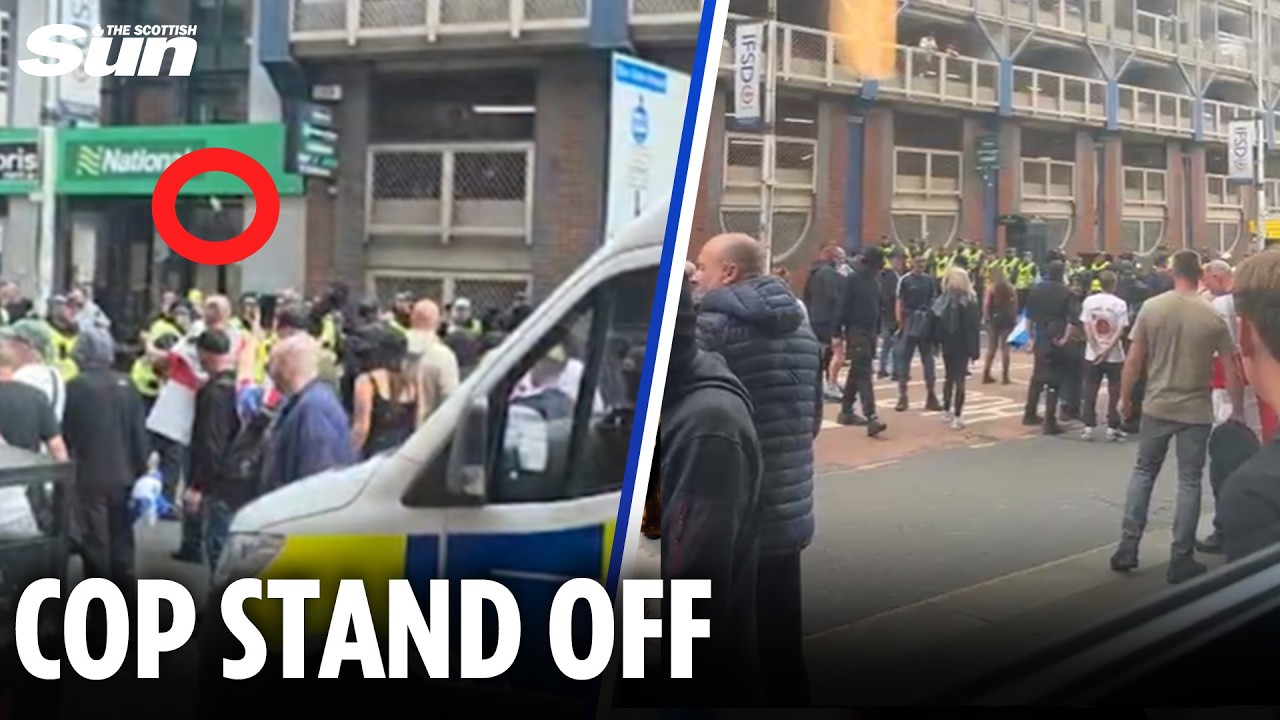 Police kettle anti-immigration protesters while BOTTLES fly in escalating scenes in Glasgow