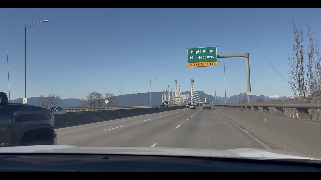 Driving in urban city walkthrough towards Pitt Meadows