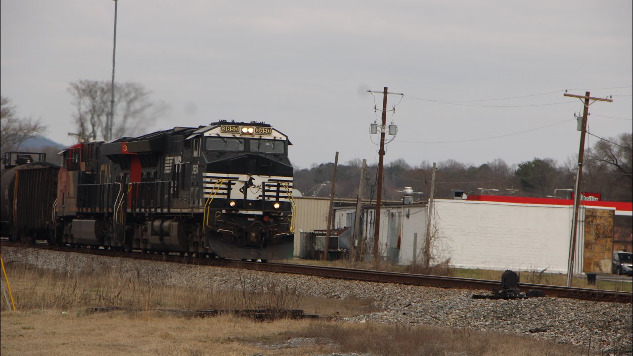 Norfolk Southern 123 with A CN trailing heads South in Rockwood Tennessee 