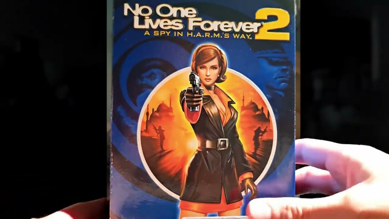 [Veo 3] Giving Kate Archer a handgun clip on No One Lives Forever 2 Game box