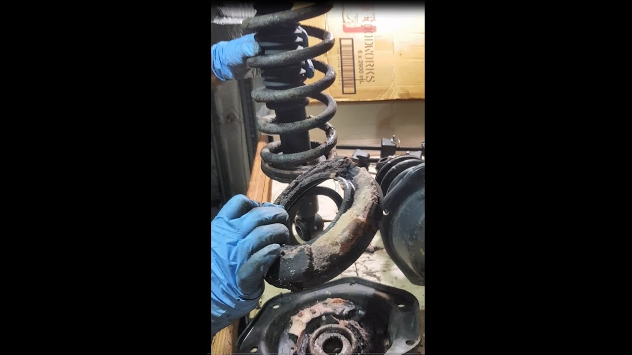 1993 Jaguar xj6 Sovereign rear shock absorber disassmbly.