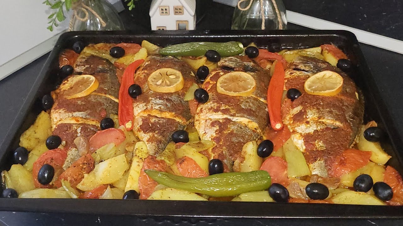 اطيب تتبيلة سمك الدوراد 🐟 ( أو مصلي الحوت )في الفرن مع خضار / poisson dorade 😋👌