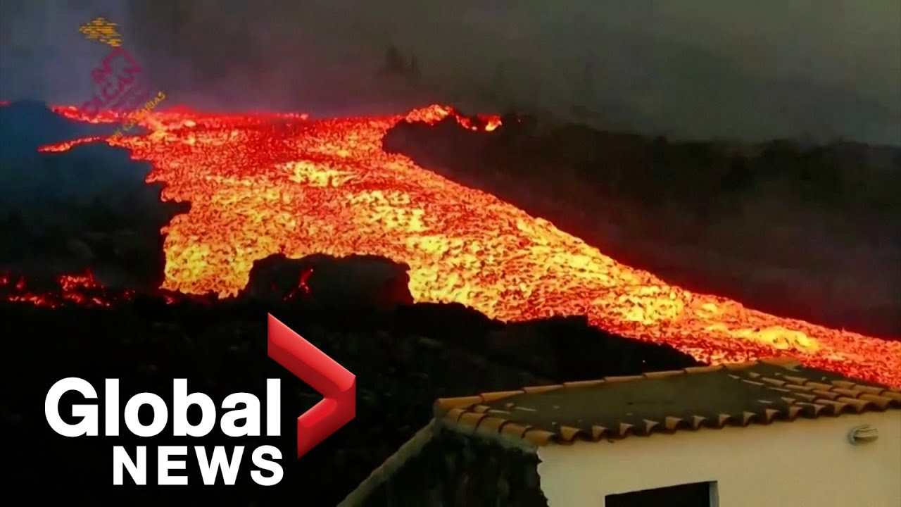 La Palma volcano: Lava "tsunami" gushes down hillside after overflowing main cone