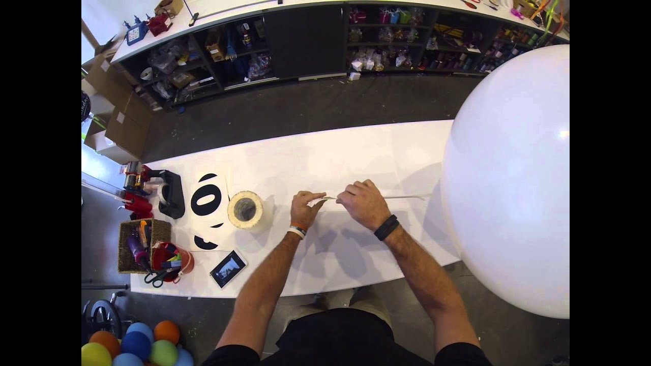 Applying vinyl numbers to a 3ft latex balloon