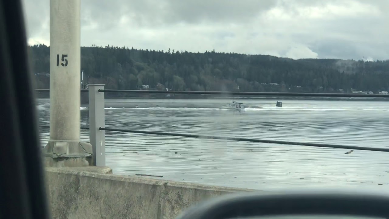 Navy Submarine Crossing Through The Hood Canal Bridge, WA