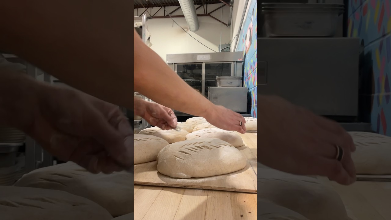 How we score and load sourdough bread in a deck oven #microbakery