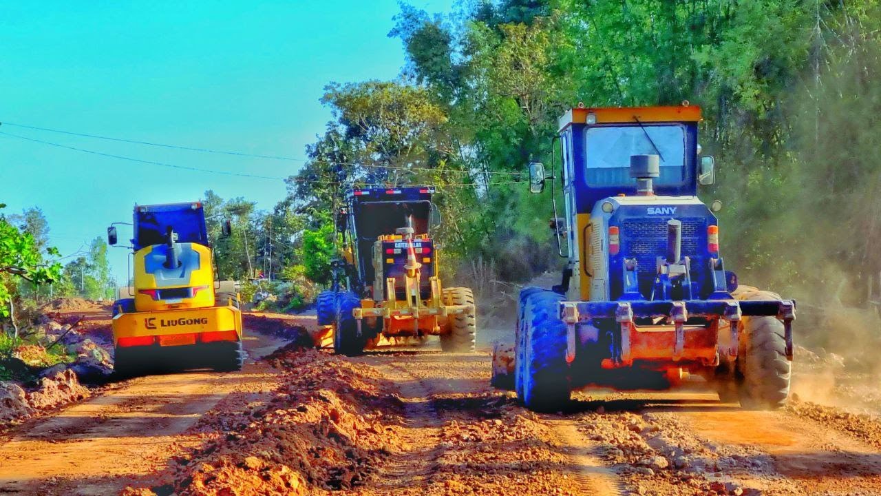 Heavy Equipment Road Construction  Grader and Roller Working Together