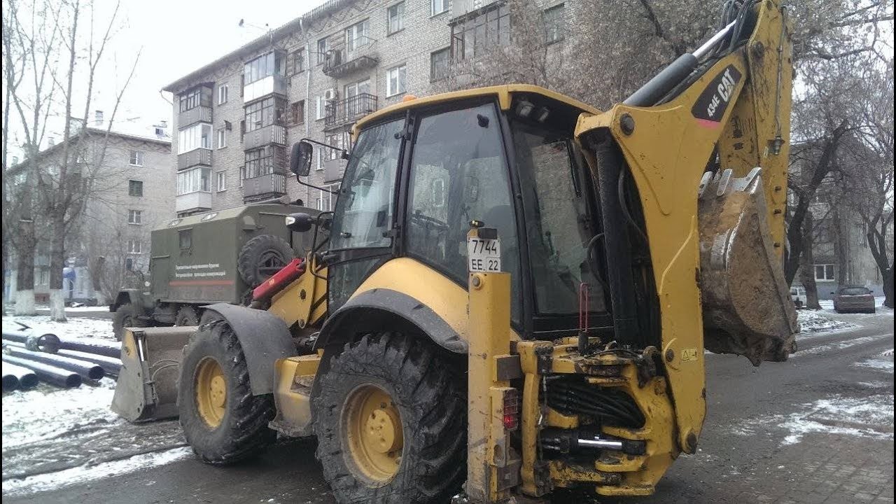 Погрузчик экскаватор CAT 434E. Обзор техники