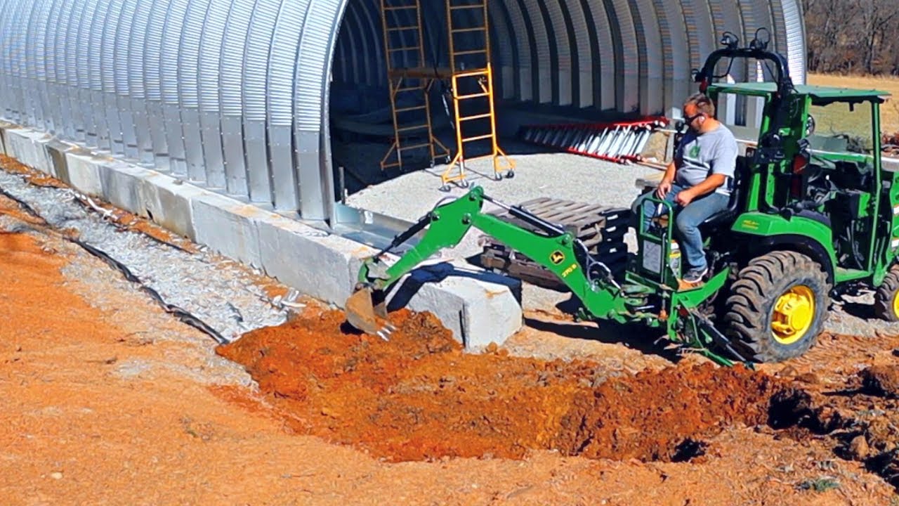 Digging Out a Hillside With a Compact Tractor