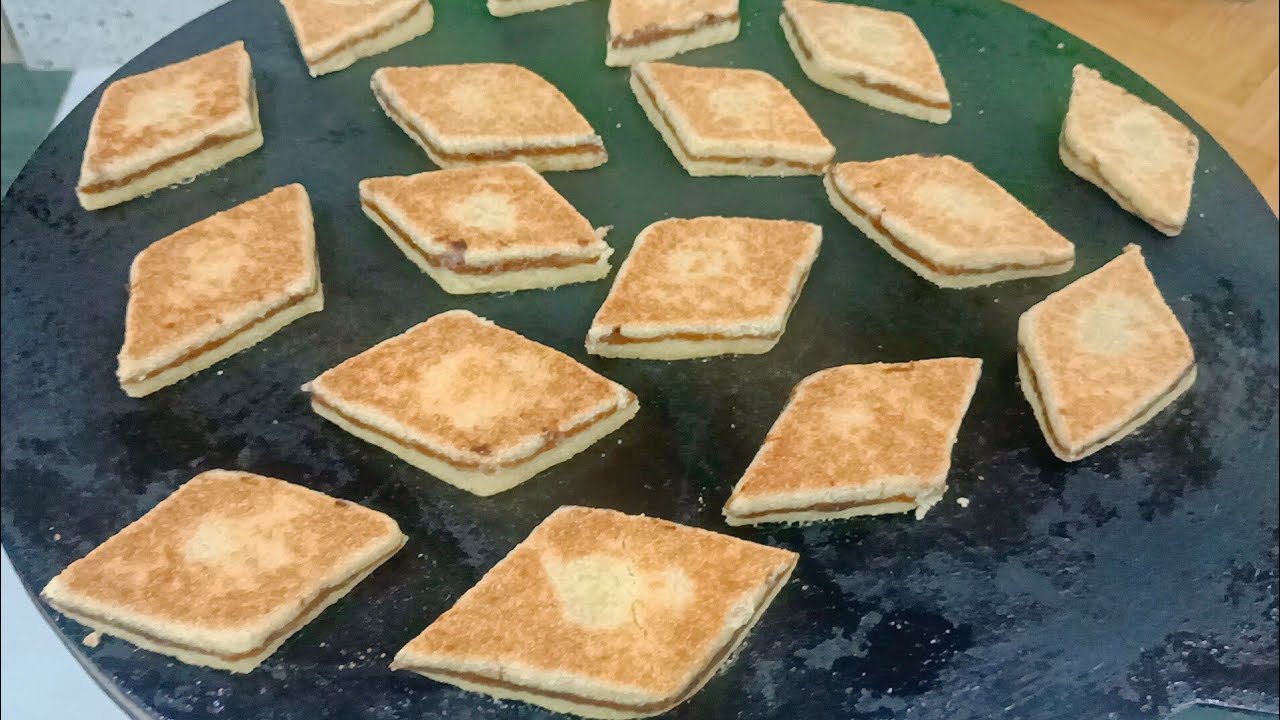 لمبرجة  التقليدية تاع الصح  لا حليب لا سر الطهى كي  ناس بكرى سميد وماء و بنينة و هشوشة وذوب في الفم