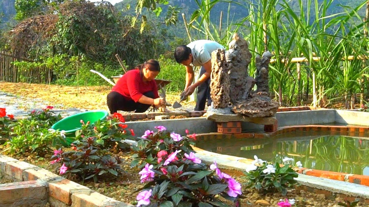 Coi and Lai built beautiful flowerbeds around the pond together.