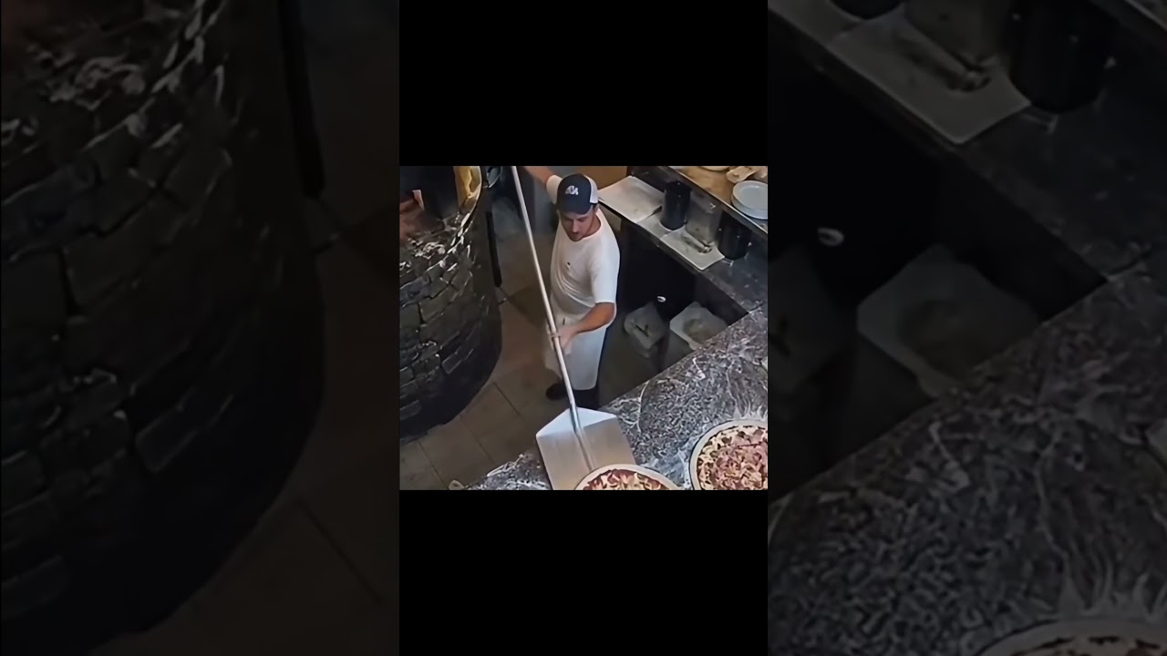 Pizza Surveillance camera caught an employee putting a RAT (that climbed onto the pizza) IN THE OVEN