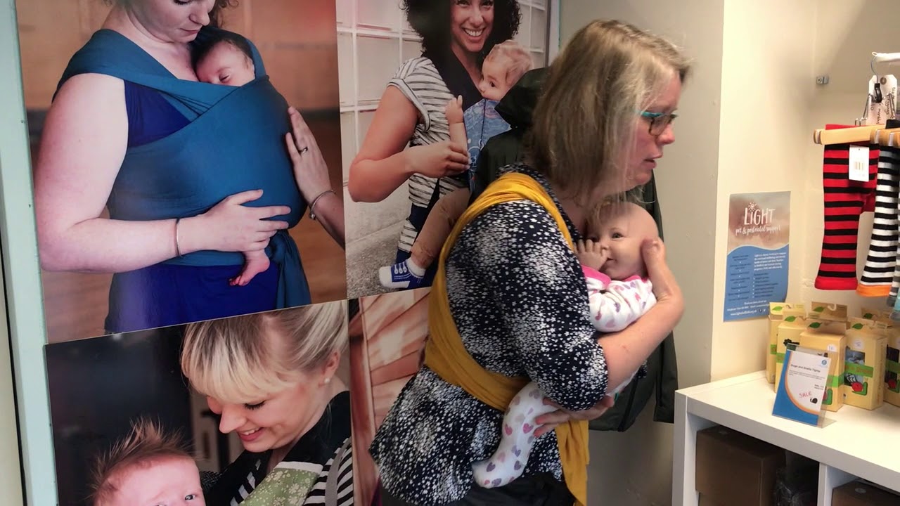 How to take a baby out of a stretchy wrap without disturbing them or untying.