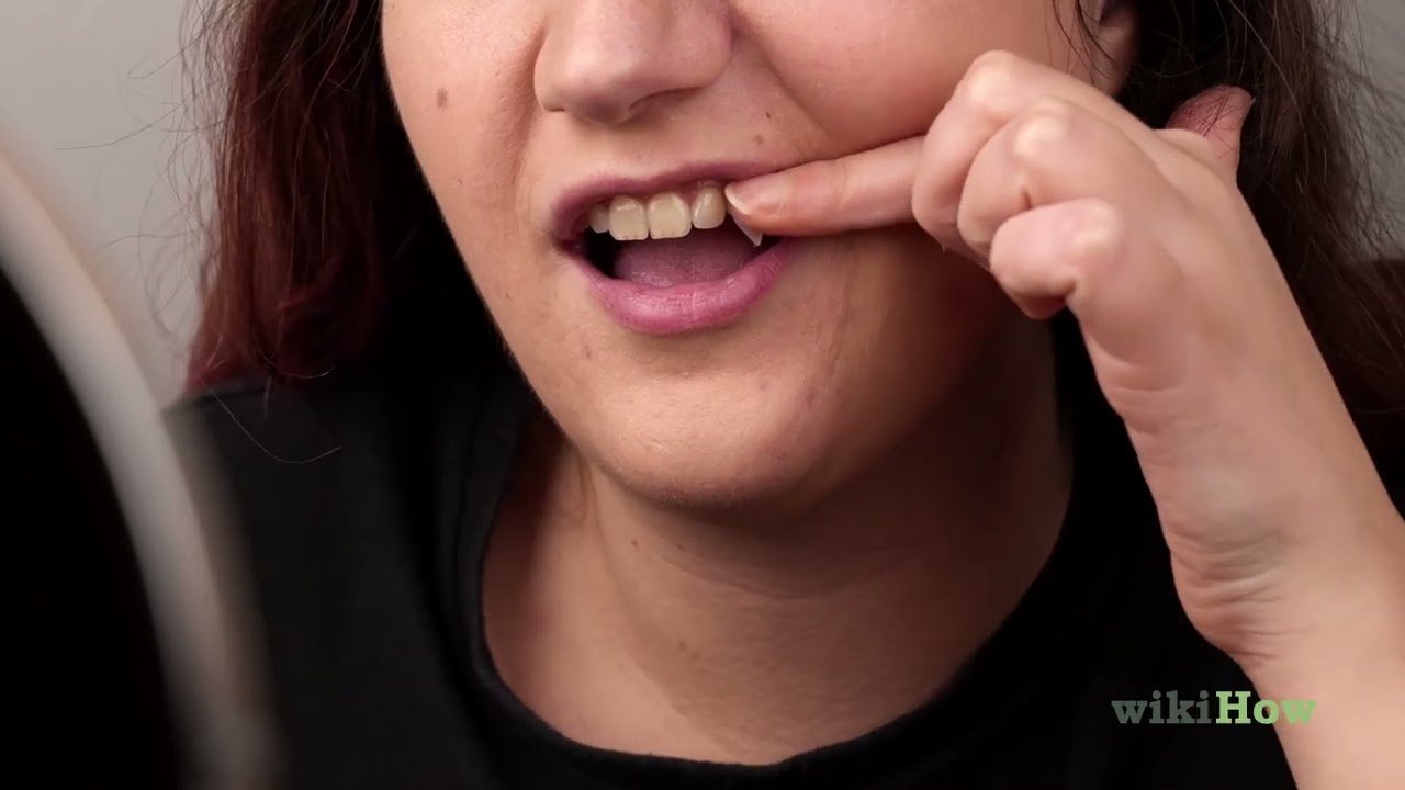 How to Apply Vampire Fangs Without Glue