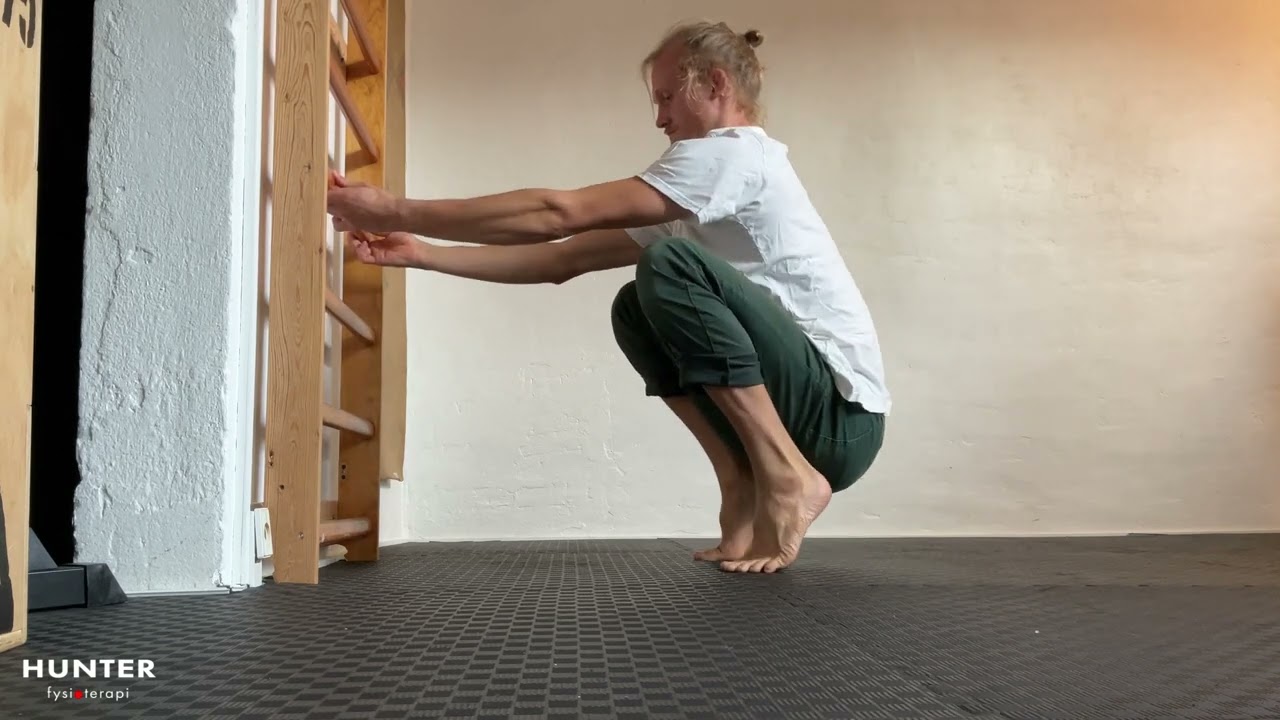 Deep Squat Heel Raises